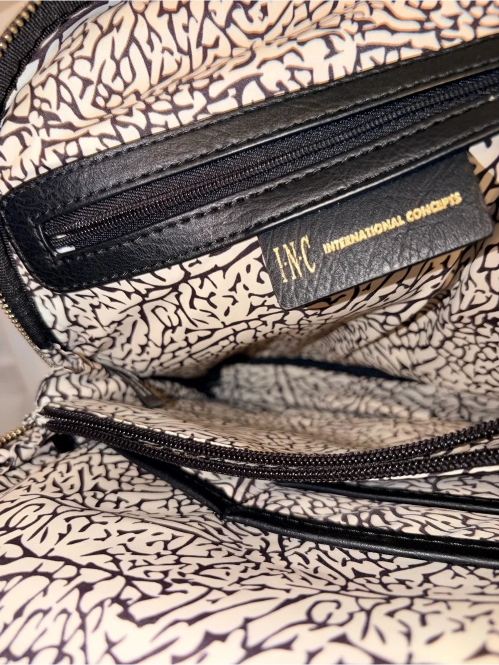 INC International Concepts Black Leather Interior with Cream Patterned Lining